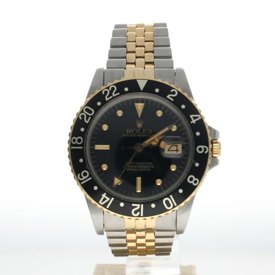 Rolex GMT-Master Stainless-steel 16753 Black Dial Mens 40-mm Automatic self-wind Sapphire crystal. Swiss Made Wrist Watch