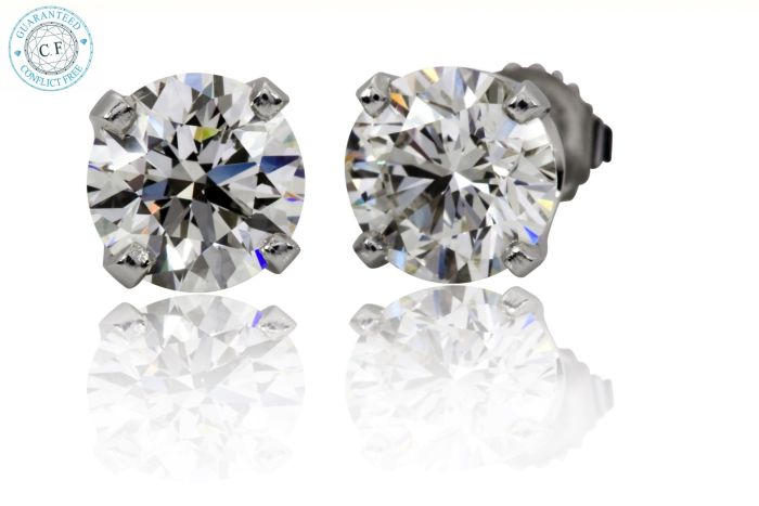 1.06 Ct. Round cut 1 Studs in 14k White Gold.